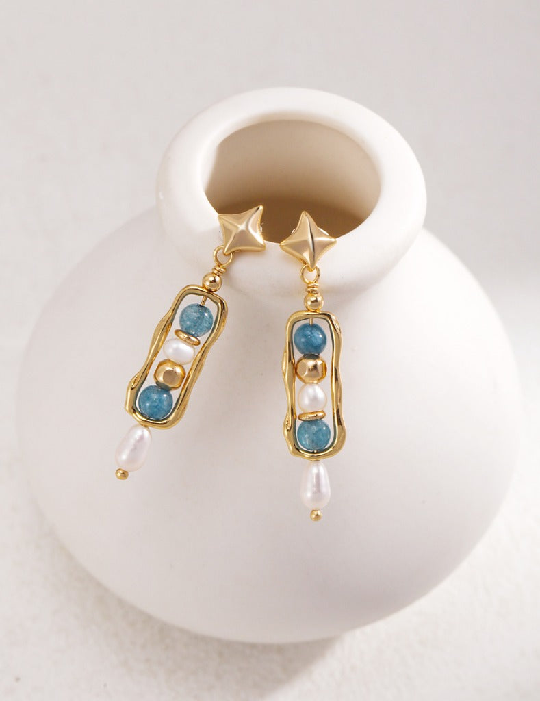 The combination of gold and blue makes the Amazonite earrings look noble and mysterious, making people want to find out more. The white pearls are the finishing touch, making the whole pair of earrings more dazzling.